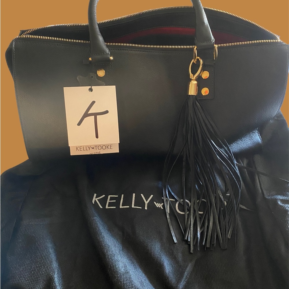 Kelly took black purse brand new! so very beautiful matching wallet separately.
